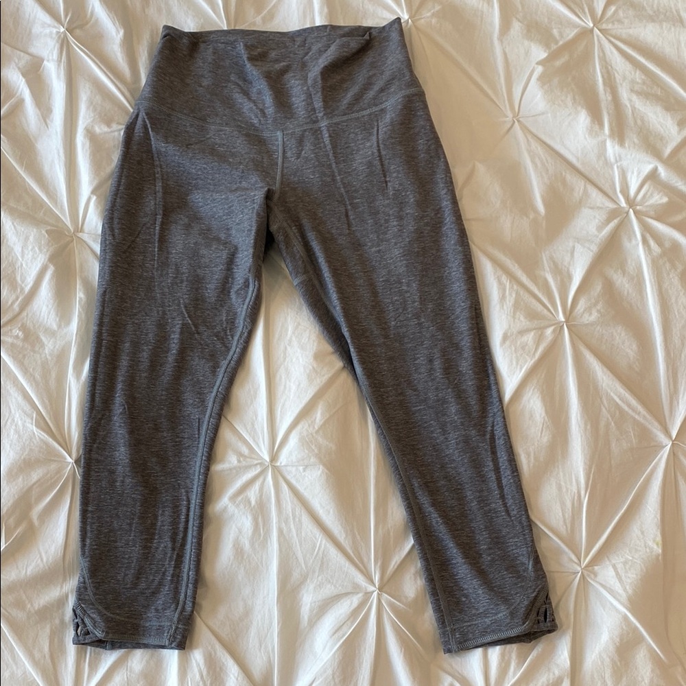 Gray Lululemon capris with webbed detail on leg - size 8! Great quality
